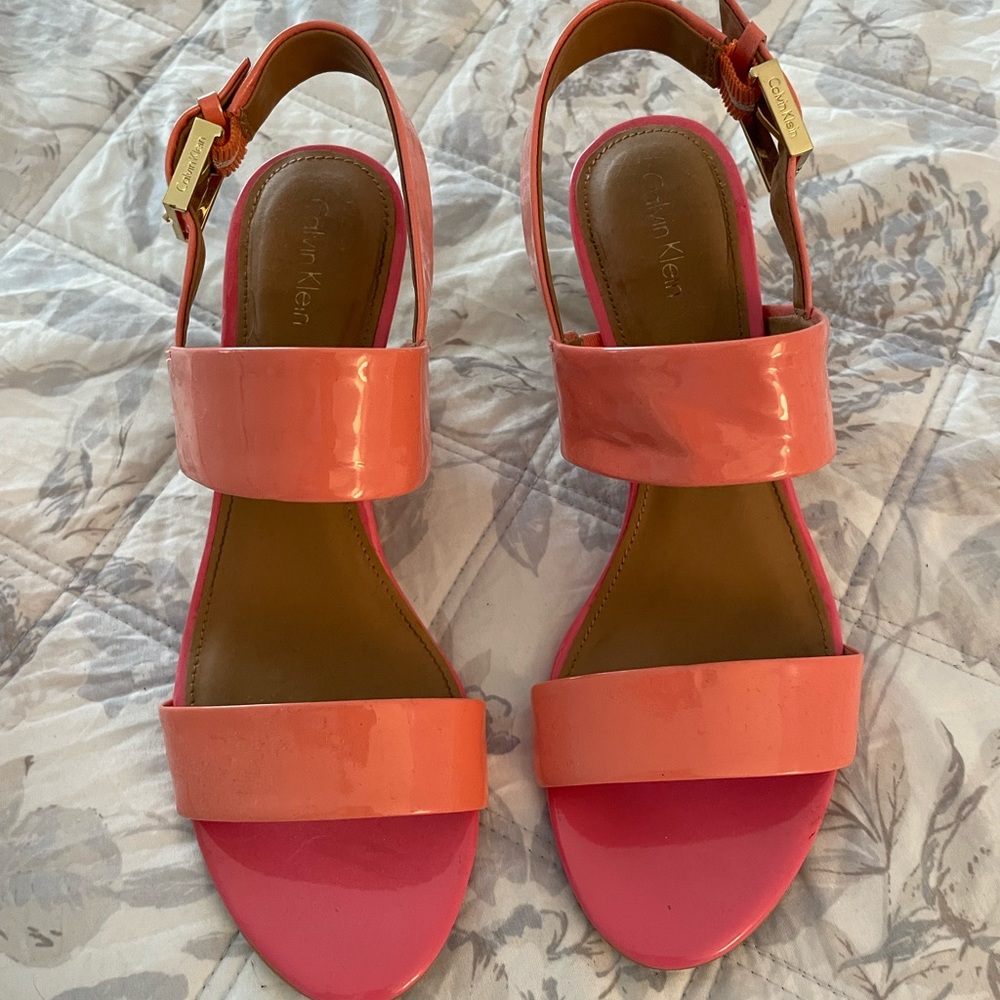 Great for the summer! Calvin Klein wedge heels in salmon and pink.